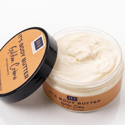 Golden Crème Body Butter in an open 9 oz jar, showing its whipped, creamy texture