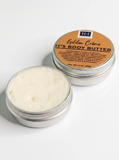 Open Golden Crème Body Butter mini tin showing the butter's texture
