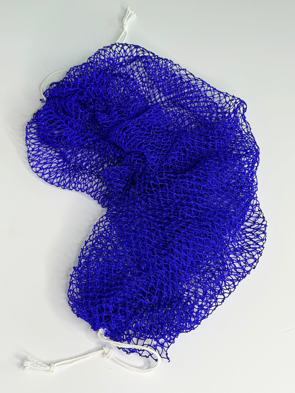 Deep Blue African net sponge laid flat