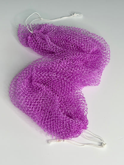 Lilac African net sponge laid flat