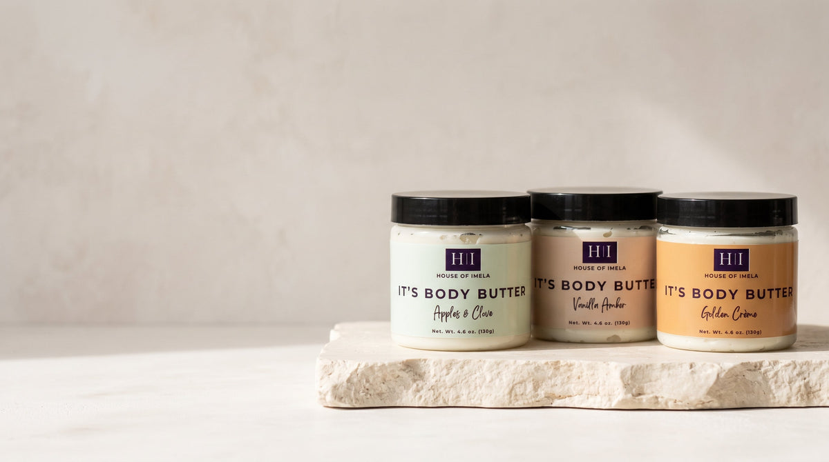 Golden Crème, Vanilla Amber and Apples & Clove body butters on stone
